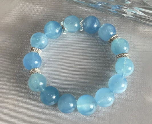 Healing Bracelets with Crystal Combinations.a blue beryl, calms stress, eases anxiety, and fosters mental clarity